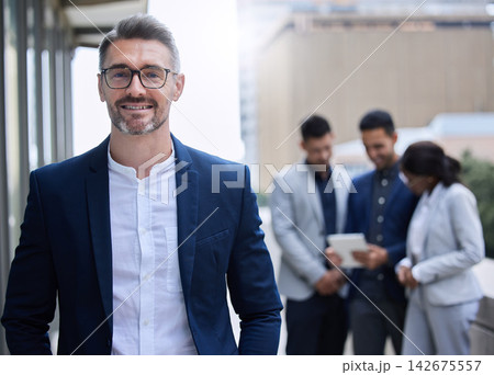 Happy, mature businessman and leader with team for confidence in employees outdoors in urban city. Smile, male person or ceo with glasses for pride, ambition and trust in staff for company startup Happy, mature businessman and leader with team for confidence in employees outdoors in urban city. Smile, male person or ceo with glasses for pride, ambition and trust in staff for company startup 142675557