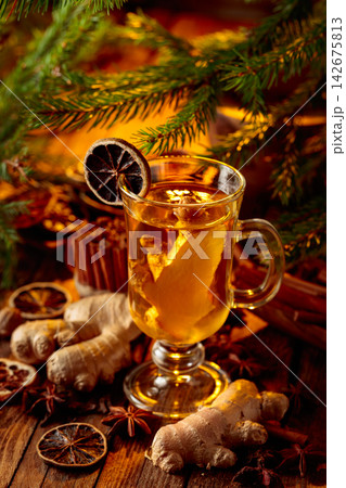 Ginger tea with spices and fir branches. 142675813