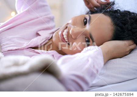 Woman, happy or morning portrait in bedroom with pyjamas for wake up rest and relax sleep. Excited, female person and head on pillow with smile for peace, comfort and lazy weekend feeling fresh Woman, happy or morning portrait in bedroom with pyjamas for wake up rest and relax sleep. Excited, female person and head on pillow with smile for peace, comfort and lazy weekend feeling fresh 142675894