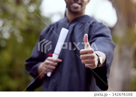 Thumbs up, graduate and diploma outdoor for celebration, achievement and education or ceremony. Person, happy and certificate in hand for university event, student success and scholarship award 142676108