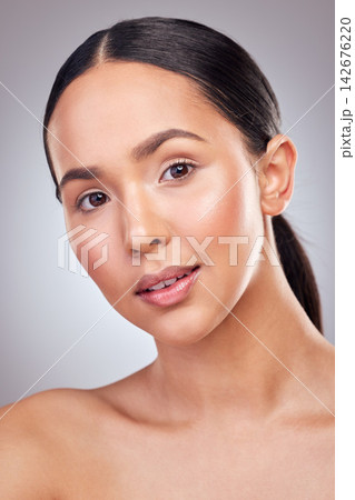 Beauty, portrait and skincare with natural woman closeup in studio on white background for wellness. Aesthetic, face and shine with serious model at salon spa for cosmetics or dermatology treatment 142676220