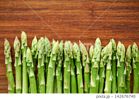 Vegetables, asparagus and produce for food with mockup, meal prep in kitchen and green ingredients on wood table. Dinner, lunch and catering with healthy cuisine for diet, fresh and organic for vegan Vegetables, asparagus and produce for food with mockup, meal prep in kitchen and green ingredients on wood table. Dinner, lunch and catering with healthy cuisine for diet, fresh and organic for vegan 142676740
