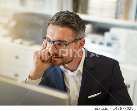 Thinking, reading or businessman with computer in office for internet, research or information for web. Legal, justice or attorney with glasses for online search, idea or planning court case defense Thinking, reading or businessman with computer in office for internet, research or information for web. Legal, justice or attorney with glasses for online search, idea or planning court case defense 142677029