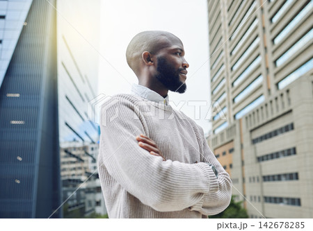 Black man, confident and thinking in city, employee and planning for career or job opportunity. Male person, arms crossed and consultant contemplating in town, urban and professional for outdoor idea 142678285