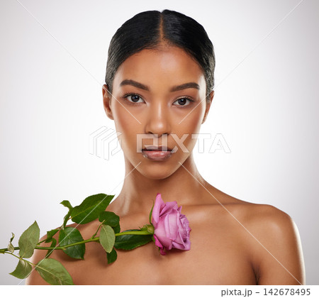 Rose, skincare and beauty portrait of woman in studio for glow, shine or health isolated on white background. Natural flower, face makeup and organic cosmetics for dermatology, wellness or serious Rose, skincare and beauty portrait of woman in studio for glow, shine or health isolated on white background. Natural flower, face makeup and organic cosmetics for dermatology, wellness or serious 142678495