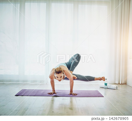 Practice, woman and dragonfly exercise with yoga for strength, arms and legs balance at home. Female yogini, fitness and training as daily routine for wellness, healthy body and flexible endurance 142678905