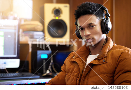 Portrait, man or sound engineer with music equipment or headphones for volume level, hearing and listening. Producer, screen and audio mixer for track record, editing and creativity in home studio Portrait, man or sound engineer with music equipment or headphones for volume level, hearing and listening. Producer, screen and audio mixer for track record, editing and creativity in home studio 142680108