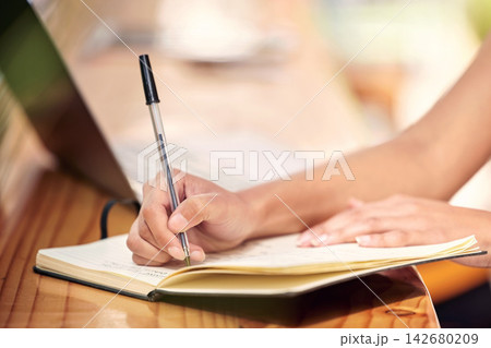 Writing, hands and florist with notebook for inventory, stocktake or order products in office. Small business, entrepreneur and person with pen at nursery for planning, checklist or price list 142680209