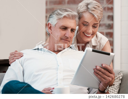 Relax, tablet and mature couple in home or house for reading on social media for election news. Streaming subscription, smile and man with happy woman with technology, internet or coffee in Canada 142680278
