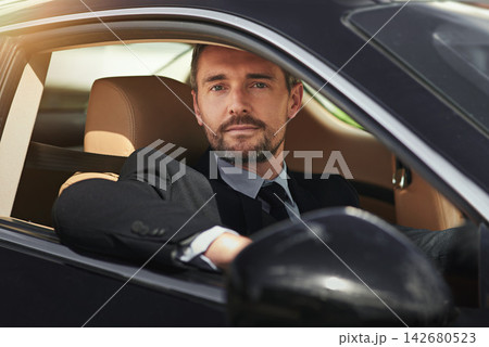 Businessman, professional and driving in car with portrait for commute to corporate work or job as entrepreneur of company. Man, motor vehicle and daily journey with transportation, smile and travel. 142680523