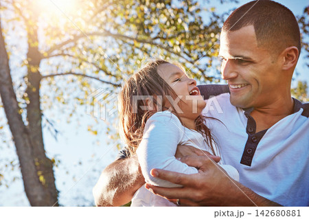 Happy, hug and dad with girl in garden, park or relax on adventure in summer, vacation or holiday. Father, love and care for child and bonding on travel in countryside or environment with family 142680881