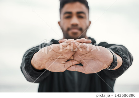 Outdoor, hands or man stretching with fitness for body flexibility, health or wellness for muscle. Blur, male athlete and sports person ready for workout, training or exercise warm up for mobility Outdoor, hands or man stretching with fitness for body flexibility, health or wellness for muscle. Blur, male athlete and sports person ready for workout, training or exercise warm up for mobility 142680890