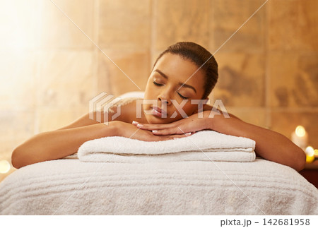 Woman, back massage and salt for treatment at spa, wellness and beauty therapy for body scrub. Female person, calm and skincare or dermatology, exfoliate and relax at resort hotel and peace for glow 142681958
