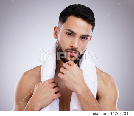 Thinking, skincare and portrait of man in studio for beauty, grooming or natural isolated on white background. Dermatology, serious face or model in cosmetics for health, wellness or clean with towel Thinking, skincare and portrait of man in studio for beauty, grooming or natural isolated on white background. Dermatology, serious face or model in cosmetics for health, wellness or clean with towel 142682049