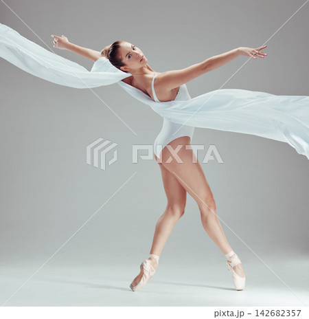 Performance, portrait and ballet in studio with woman, fabric and fitness in studio for dancing and balance. Female dancer, contemporary and art by white background for movement, beauty and grace Performance, portrait and ballet in studio with woman, fabric and fitness in studio for dancing and balance. Female dancer, contemporary and art by white background for movement, beauty and grace 142682357
