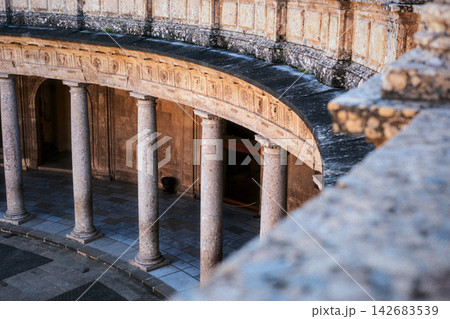 Columns and detailed frieze of the palace of charles v in the alhambra, granada. Ancient architecture in spain Columns and detailed frieze of the palace of charles v in the alhambra, granada. Ancient architecture in spain 142683539