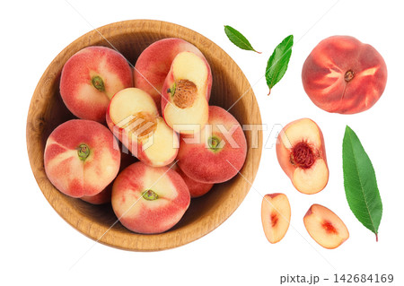 chinese flat donut peaches in wooden bowl isolated on white background. Top view. Flat lay chinese flat donut peaches in wooden bowl isolated on white background. Top view. Flat lay 142684169