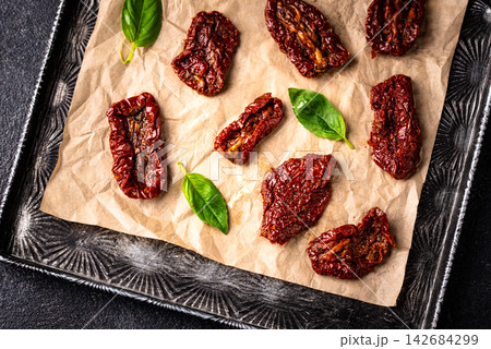 Sun dried tomatoes, traditional italian food Sun dried tomatoes, traditional italian food 142684299