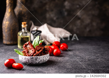 Sun dried tomatoes, traditional italian food Sun dried tomatoes, traditional italian food 142684302