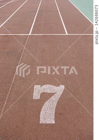 Running Track Lane Seven with White Lines on Outdoor Sports Surface Running Track Lane Seven with White Lines on Outdoor Sports Surface 142686073