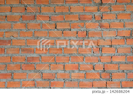 Red Brick Wall Texture Background with Gray Mortar Red Brick Wall Texture Background with Gray Mortar 142686204