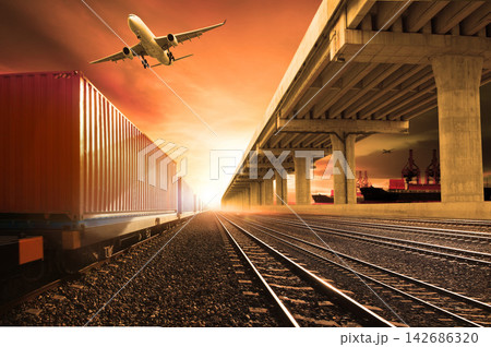 Global Logistics with Freight Train, Cargo Ship, and Airplane at Sunset Global Logistics with Freight Train, Cargo Ship, and Airplane at Sunset 142686320