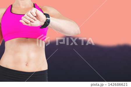 Fitness Woman Checking Smartwatch During Workout with Copy Space Fitness Woman Checking Smartwatch During Workout with Copy Space 142686621