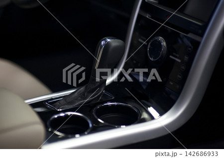 Car Gear Shift and Center Console Interior Close Up Car Gear Shift and Center Console Interior Close Up 142686933