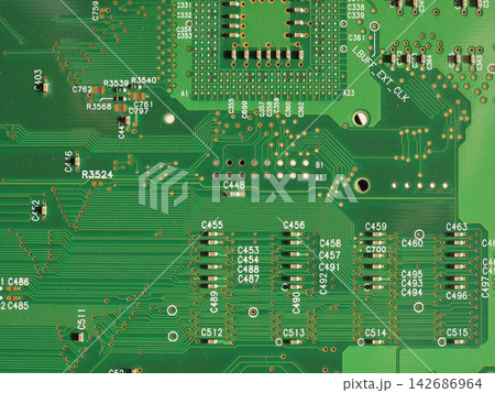 Green Circuit Board Close-Up with Electronic Components Green Circuit Board Close-Up with Electronic Components 142686964