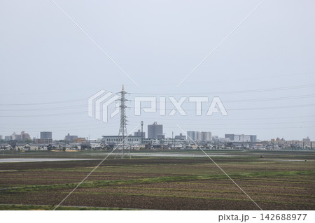 April 27 2026 Morioka Sendai farmland pattern with irrigation channels and rural horizon 142688977