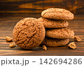 Oatmeal cookies close-up on a wooden background. 142694286
