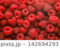 Ripe raspberries close-up, background. Top view 142694293