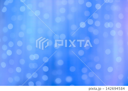blurred focus of decorative lights in blue background blurred focus of decorative lights in blue background 142694584