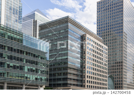 Corporate glass architecture in canary wharf financial district Corporate glass architecture in canary wharf financial district 142700458