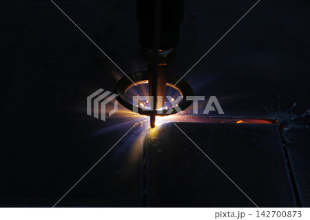 CNC Laser cutting of metal, modern industrial technology. 142700873