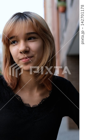 Smiling Teenage Schoolgirl with Dyed Blonde and Peach Hair Outdoors, Friendly Teen Portrait, Confidence, Positive Mood and Youth Lifestyle Smiling Teenage Schoolgirl with Dyed Blonde and Peach Hair Outdoors, Friendly Teen Portrait, Confidence, Positive Mood and Youth Lifestyle 142701178