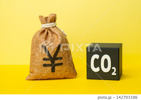 A CO2 cube and a yen or yuan money bag. Waste recycling and profit generation. Recycling grants. Reducing environmental impact while generating income. A CO2 cube and a yen or yuan money bag. Waste recycling and profit generation. Recycling grants. Reducing environmental impact while generating income. 142703386