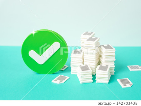 An approval checkmark and piles of documents and papers. Concept of bureaucracy and paperwork approval. Symbol of successful audit, verification and administrative process. An approval checkmark and piles of documents and papers. Concept of bureaucracy and paperwork approval. Symbol of successful audit, verification and administrative process. 142703438