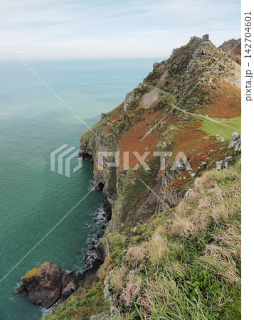 Steep sea cliffs and Rugged Jack from Castle Rock, Exmoor, Devon Steep sea cliffs and Rugged Jack from Castle Rock, Exmoor, Devon 142704601