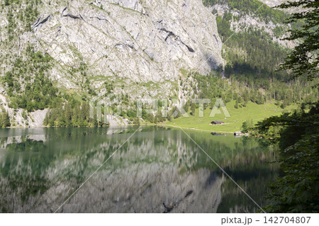 Fischunkelalm at lake Obersee, lake Konigssee, in the Berchtesgaden Alps, Bavaria, Germany Fischunkelalm at lake Obersee, lake Konigssee, in the Berchtesgaden Alps, Bavaria, Germany 142704807