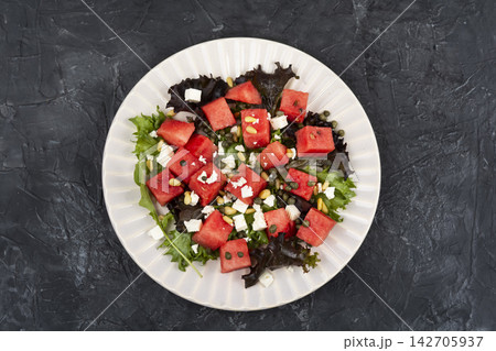 Mediterranean Watermelon and Feta Salad with Capers and Pine Nuts Mediterranean Watermelon and Feta Salad with Capers and Pine Nuts 142705937