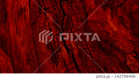 Deep Red Cracks Pattern Similar to Hot Magma Close Up View. Intense Red Molten Surface With Black Cracks 142706406