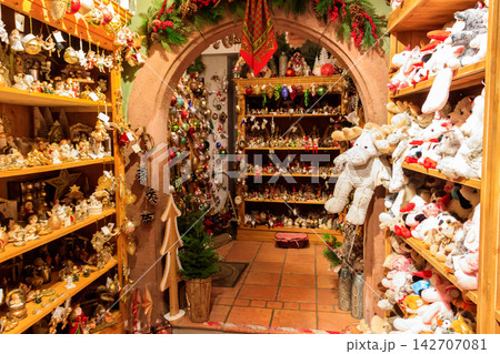 Christmas and New Year's toys in a store. Festive winter Christmas trade 142707081
