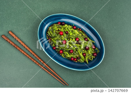 Seaweed superfood salad with cranberries and greens. Seaweed superfood salad with cranberries and greens. 142707669