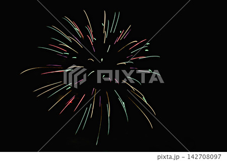Fireworks lighting up the night sky. Pyrotechnics, abstract	 142708097