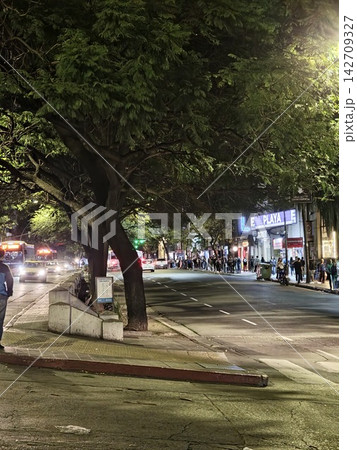 Cordoba, Argentina - April 10, 2026: Evening Traffic and Pedestrians on Boulevard San Juan Cordoba, Argentina - April 10, 2026: Evening Traffic and Pedestrians on Boulevard San Juan 142709327