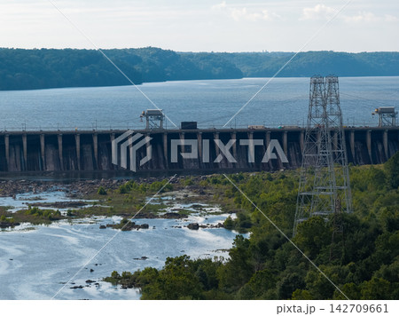 Aerial view of a large hydroelectric power plant dam on a river Aerial view of a large hydroelectric power plant dam on a river 142709661