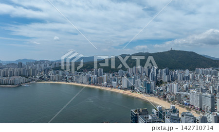 Aerial View of Gwangan Bridge, Marine City Skyline, and Dongbaekseom Island in Busan, South Korea Aerial View of Gwangan Bridge, Marine City Skyline, and Dongbaekseom Island in Busan, South Korea 142710714
