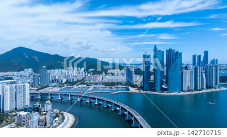 Aerial View of Gwangan Bridge, Marine City Skyline, and Dongbaekseom Island in Busan, South Korea Aerial View of Gwangan Bridge, Marine City Skyline, and Dongbaekseom Island in Busan, South Korea 142710715