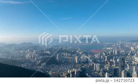 Aerial View of Gwangan Bridge, Marine City Skyline, and Dongbaekseom Island in Busan, South Korea 142710723